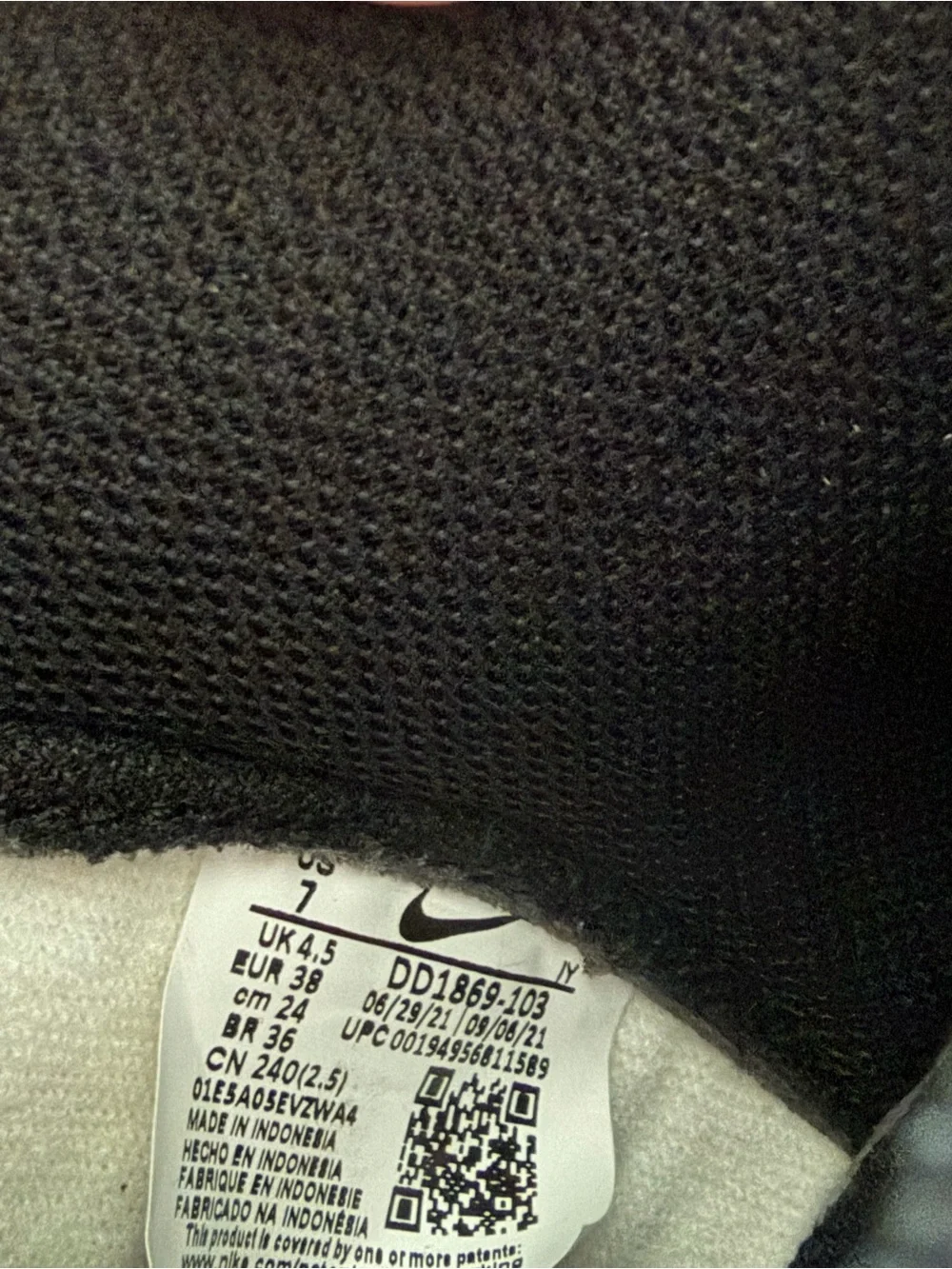 Nike Women's Black and White High-Top Sneakers